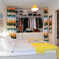 Wardrobe in the bedroom of a small apartment