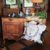 Antique dishes on a wooden fireplace