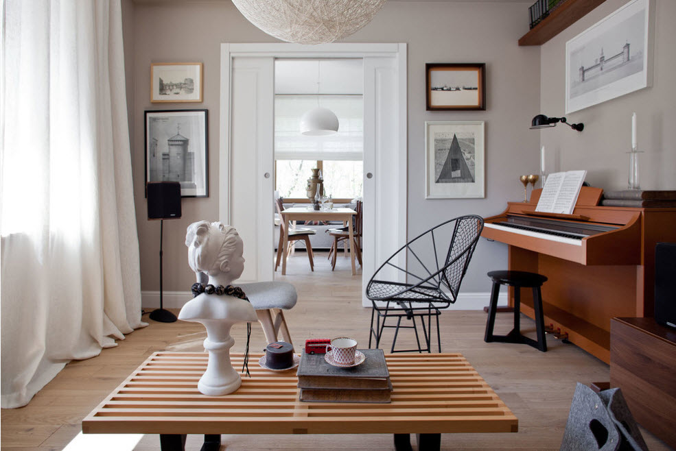 White figurine on a wooden coffee table