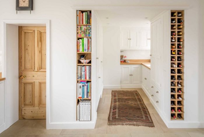 A narrow niche for books in the doorway