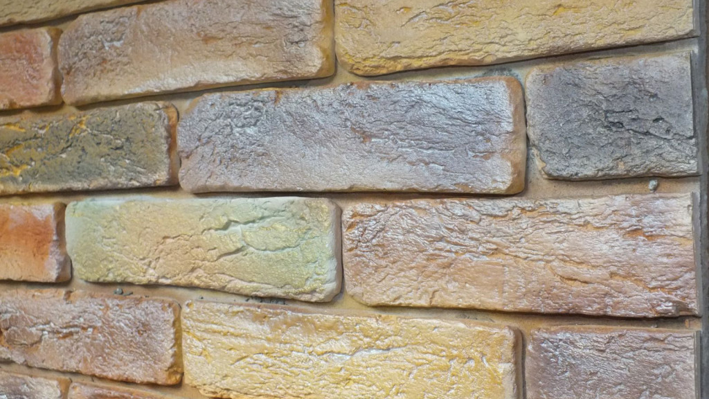 Multi-colored painting of a brick wall