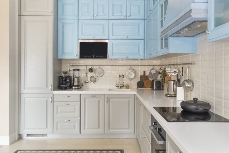 The combination of gray and blue in a small kitchen