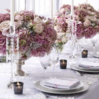 Table decoration with lilac flowers