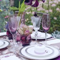 Table decoration in purple tones.