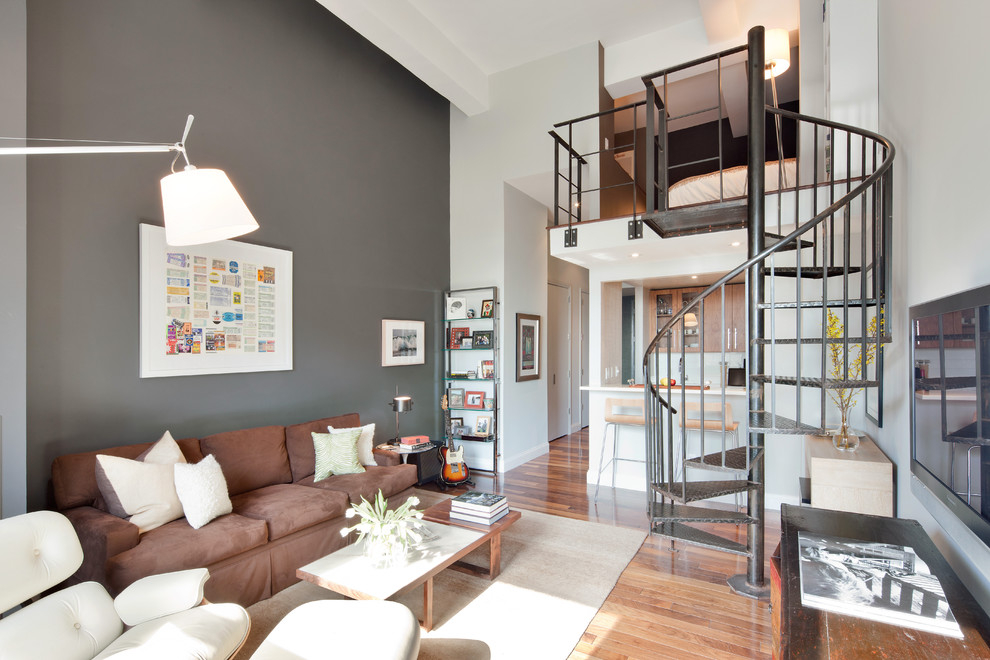 Metal spiral staircase in the interior of the apartment