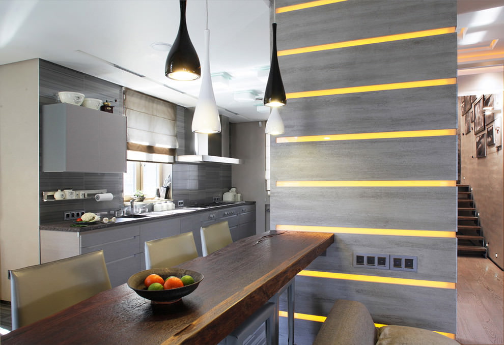 Pendant lights with black shades above the bar