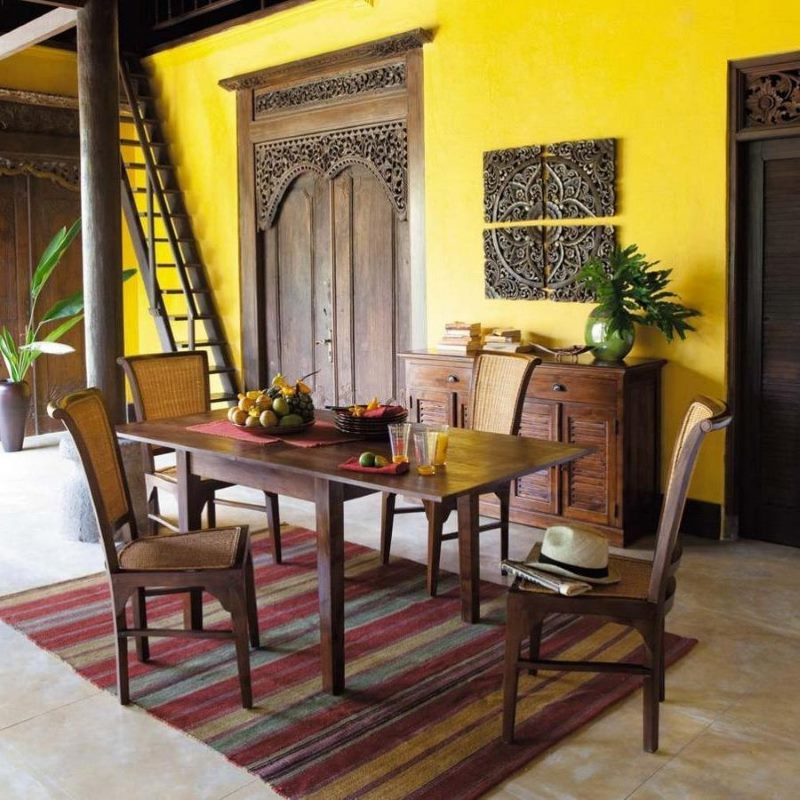 Interior of a modern kitchen with colonial-style dining area