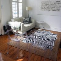 Transparent chairs in the living room interior