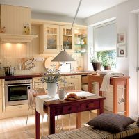 Kitchen-living room interior with balcony