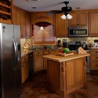 Wooden furniture in the interior of the kitchen