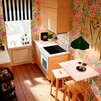 Small kitchen with wooden stools