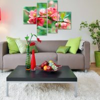 Bright modular picture over a gray sofa