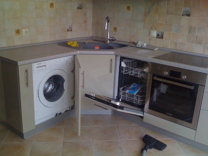 Dishwasher and corner cupboard.