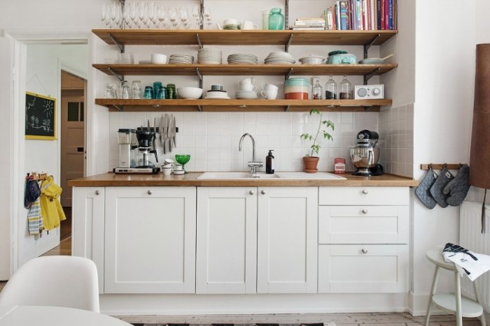 Wooden shelves in the interior of the kitchen.