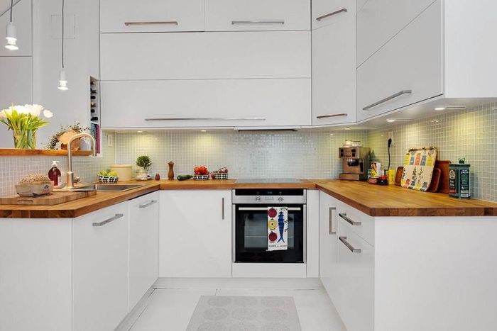 U-shaped wooden kitchen.