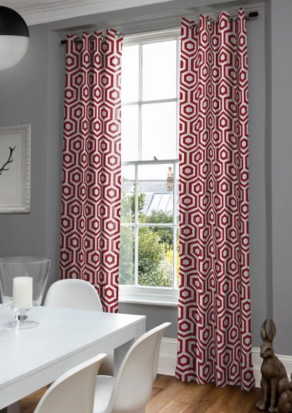 Curtains with geometry can visually expand or narrow your room. Be careful when choosing them.