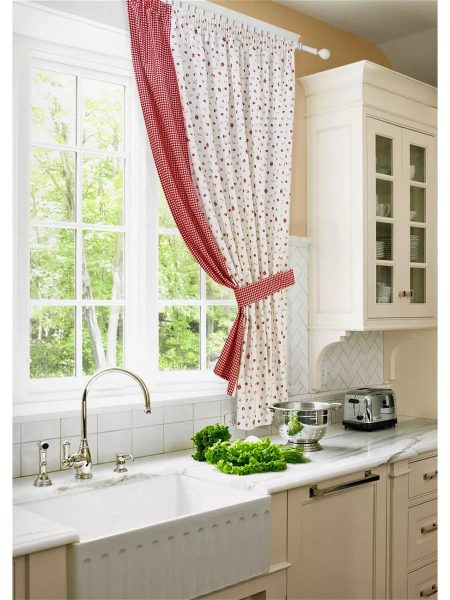 For a small kitchen, it is better to choose light curtains with a small print.