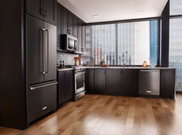 Refrigerator in a large kitchen.