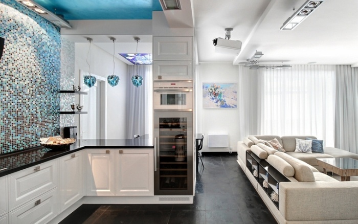 The interior of the kitchen-living room in a small apartment.